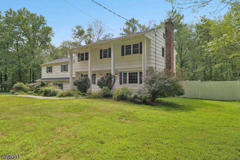 Beautifully Renovated Colonial with Timeless Elegance and Modern Comforts Walk to Schools !