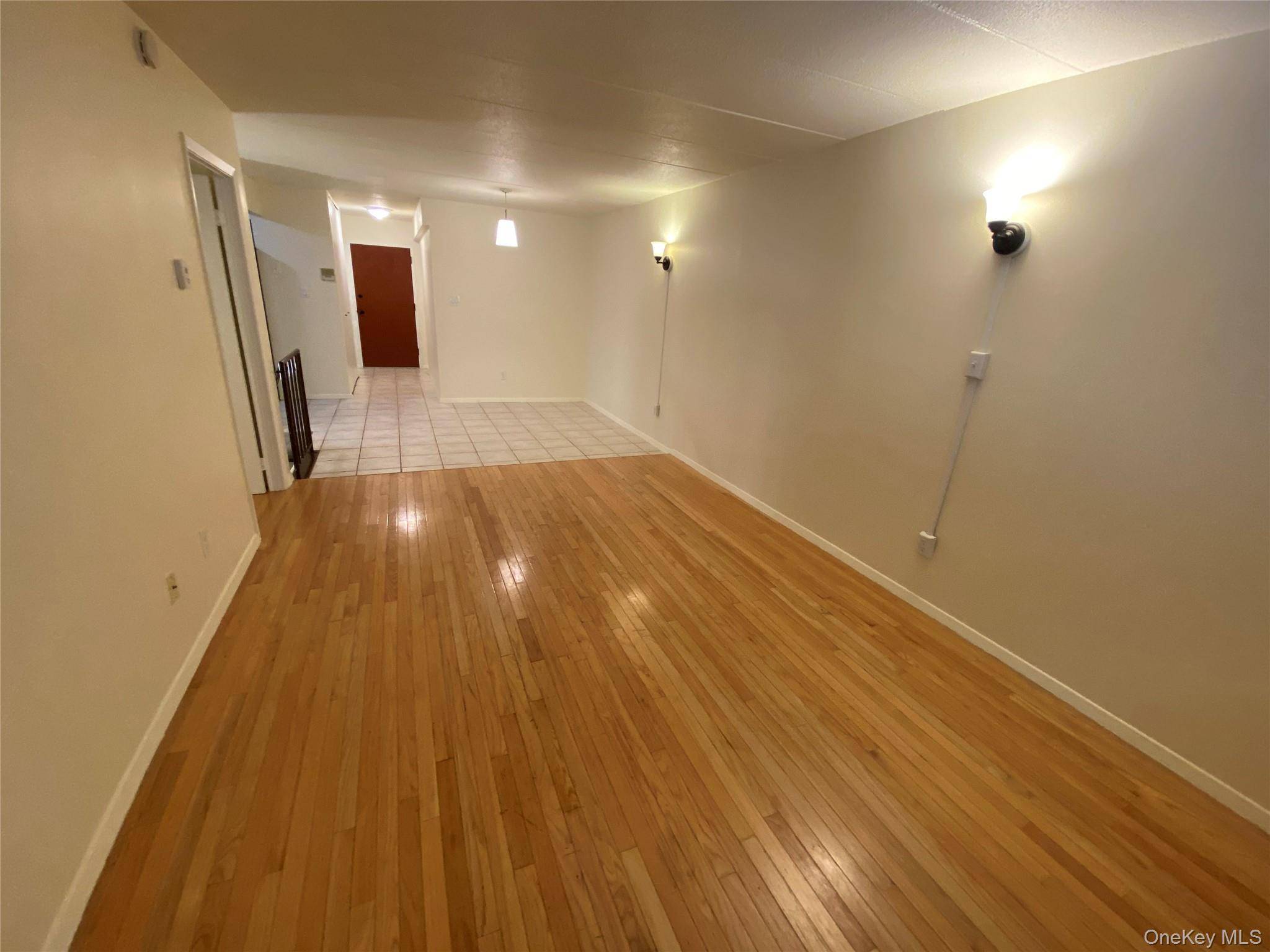 Renovated Kitchen, Excellent Condition, 2 Bedrooms Duplex With Laundry Room, 1 Car Garage With Driveway, Back Yard.
