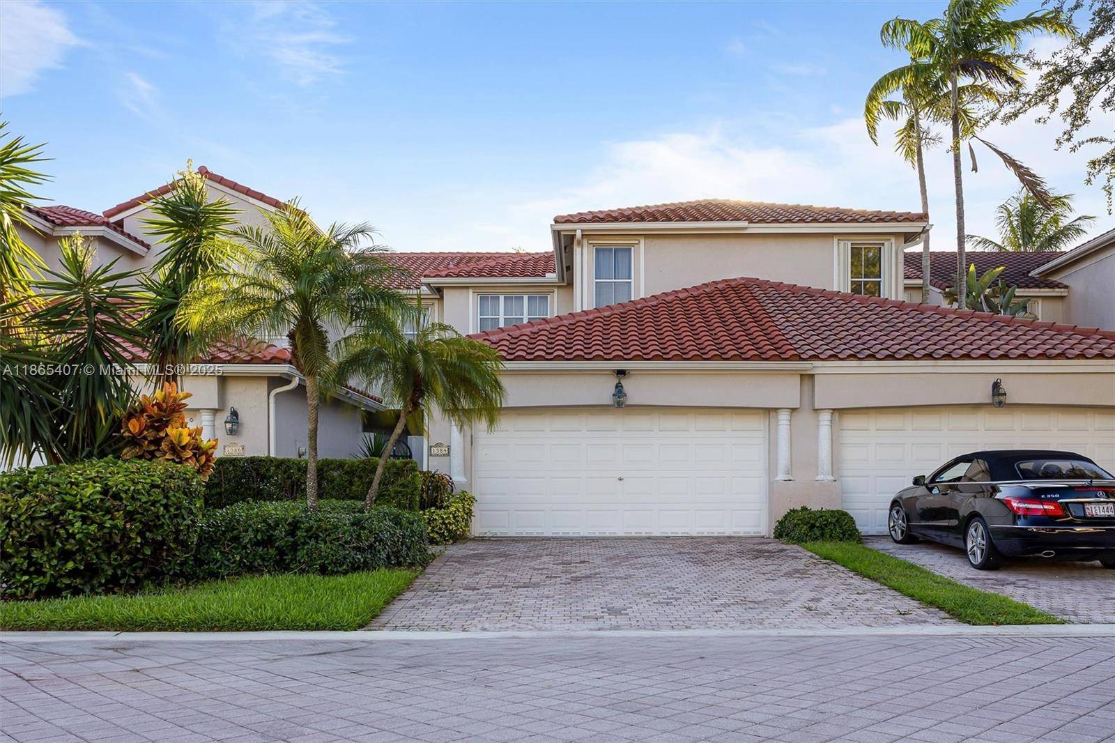 Located in the prestigious gated community of Harbor Islands, this 3 bedroom, 3.