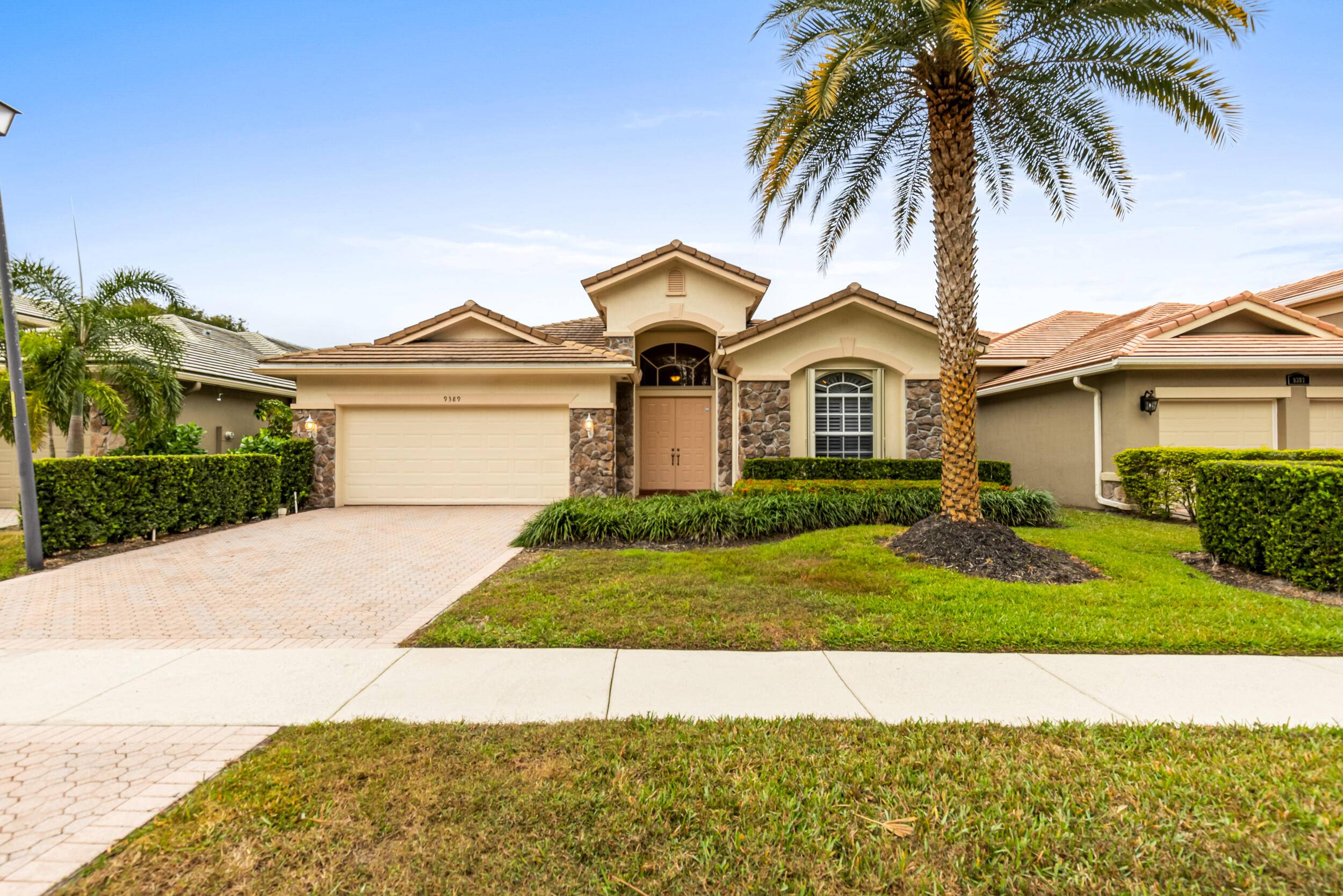 Nestled in the prestigious Osprey Isles community, 9389 Osprey Isles Blvd offers a luxurious lifestyle with unparalleled views of a pristine golf course.