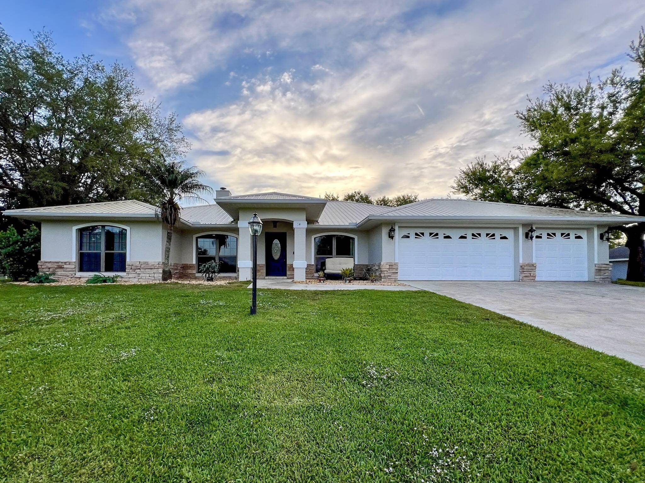 Nestled in the heart of the peaceful small town of Lake Placid is 14 Meadowlake Circle South.