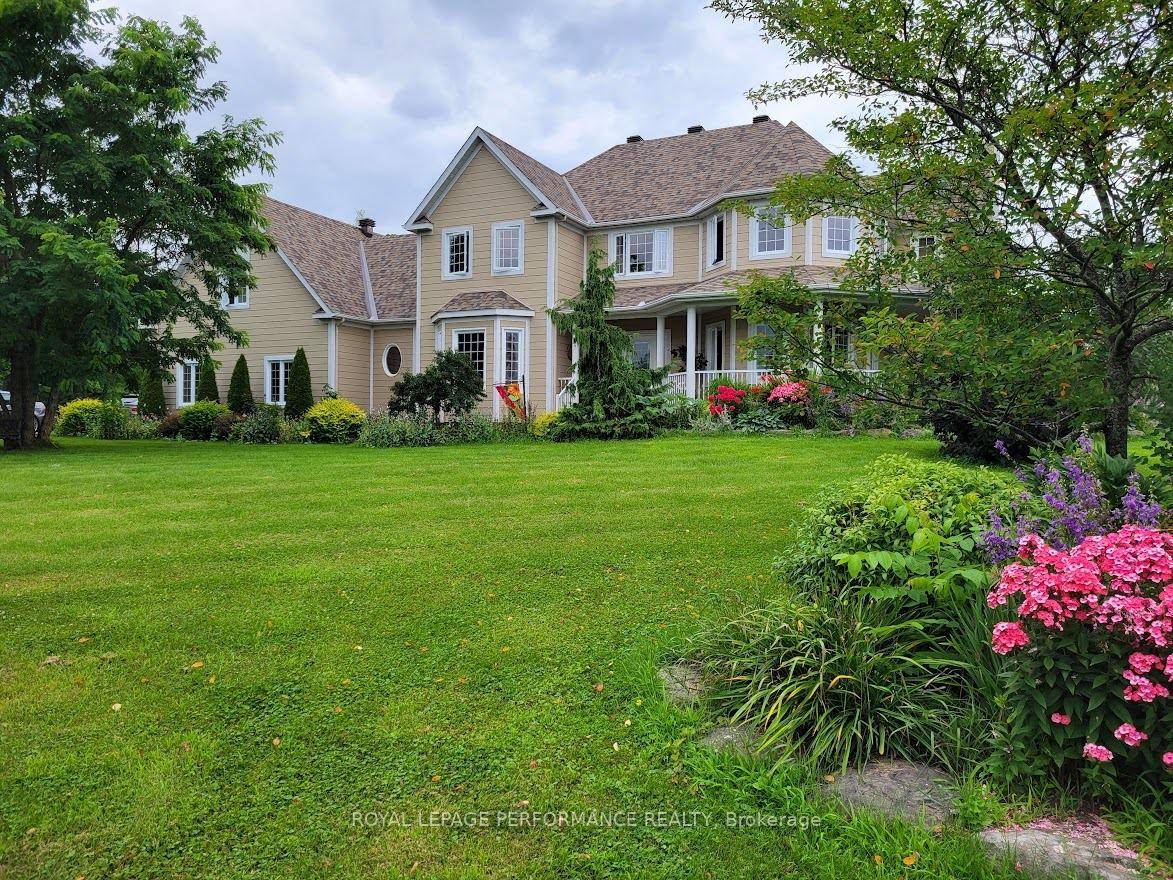 This stunning modern traditional home is set on 2.