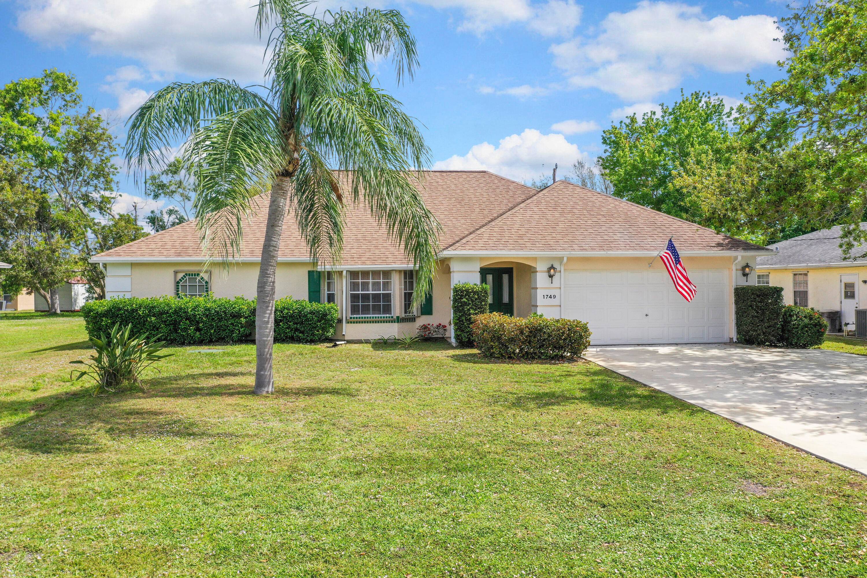 NEW ROOF just installed. Spacious 3 br 2 bath 2 car garage pool home located east of US 1.