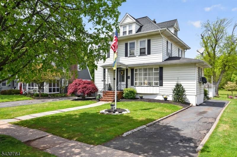 Beautiful Colonial located on a quiet tree lined street offering timeless charm and generous living space.