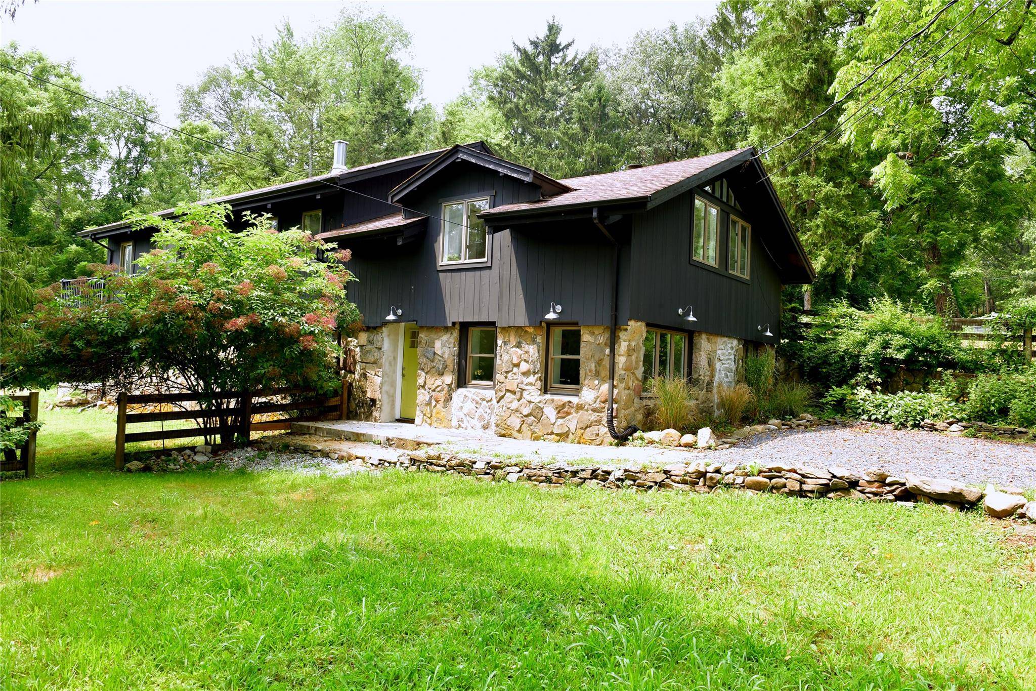 Located in the vibrant town of Warwick NY you will find this renovated gem situated on 1 acre of park like property surrounded by mature trees.
