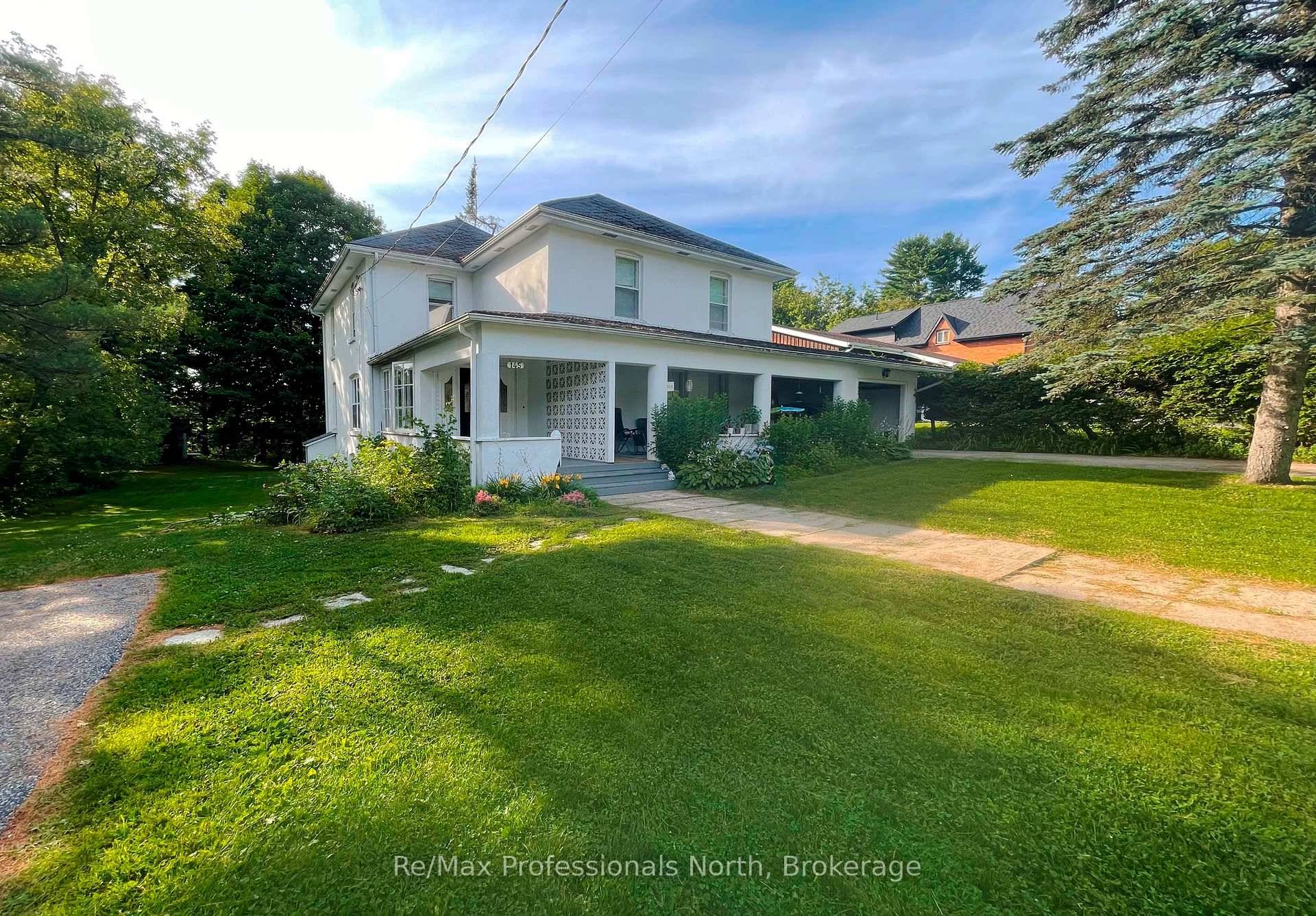 Charming Century Duplex with Timeless Character and Income Potential.