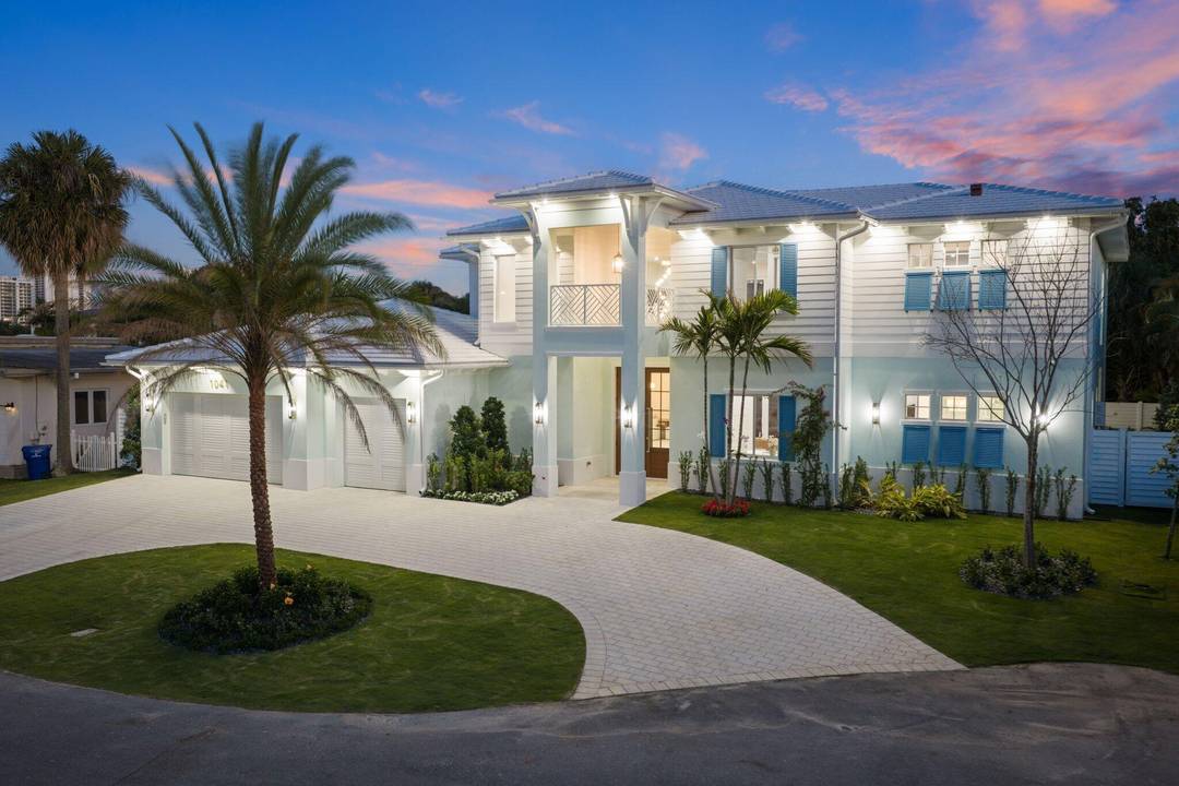 Experience the ultimate in Island living with this custom built home with waterfront views !