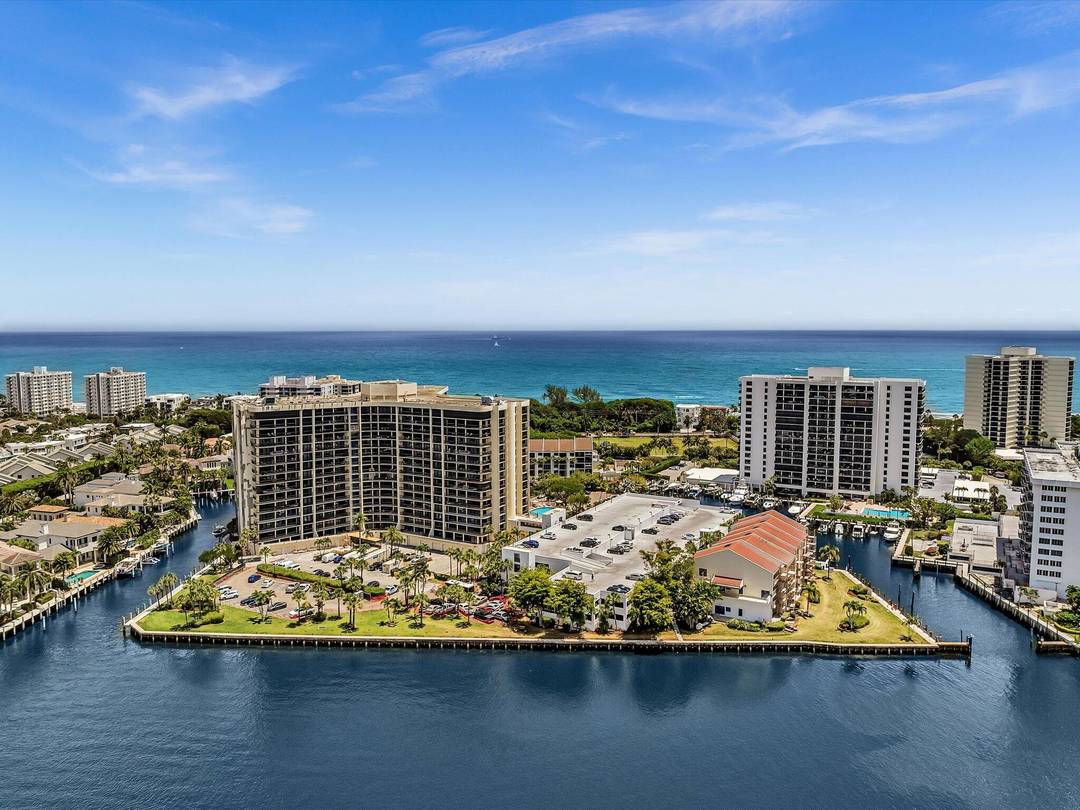 Highly Desirable Northwest Corner Condo in Braemar Isle With Sweeping Views of the Intracoastal, Lush Foliage, and Waterfront Estates.