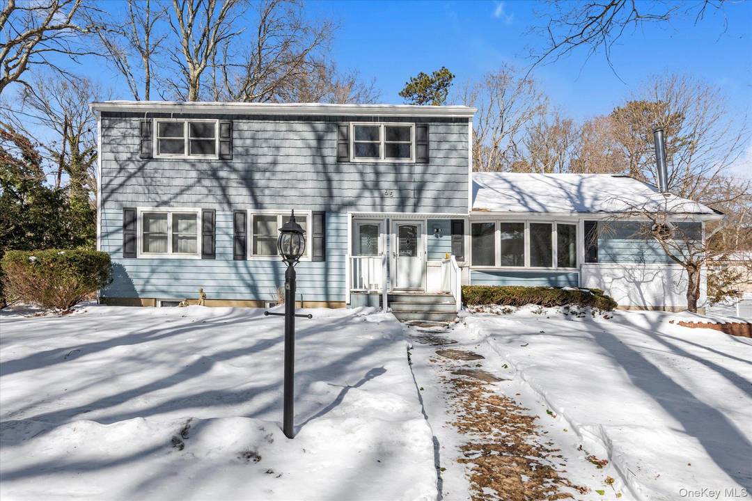 Welcome to 65 Lone Oak Path in Smithtown Pines.
