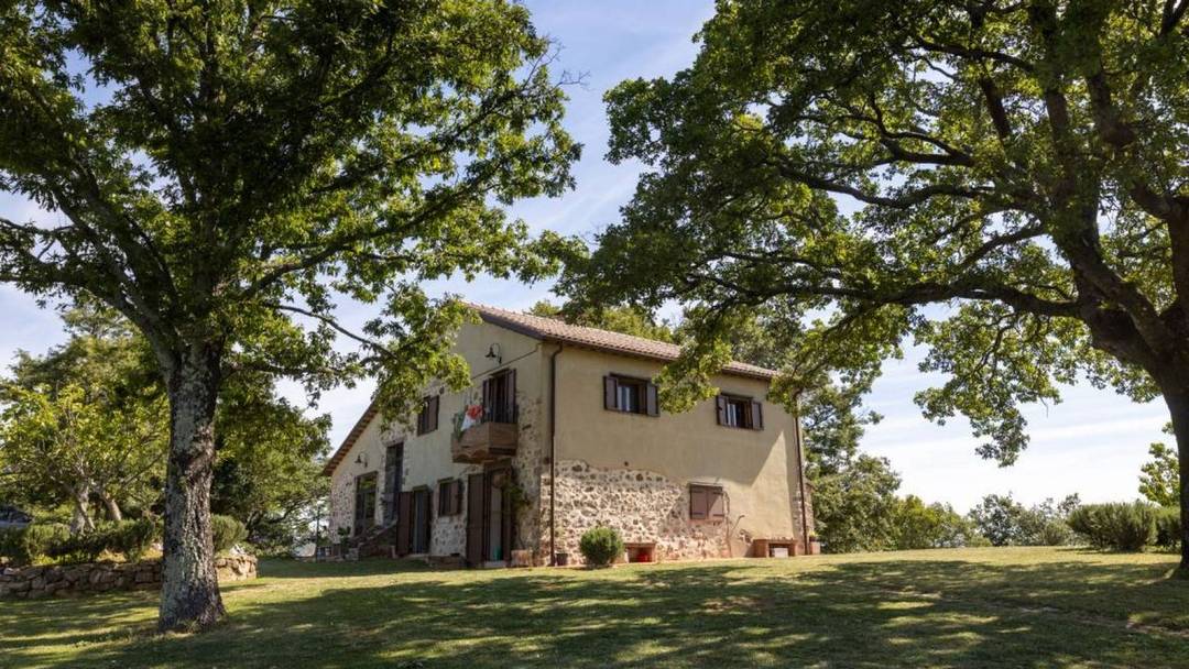 Beautiful restored farmhouse near Saturnia with 60 hectares, panoramic views to Argentario, independent entrances and authentic Tuscan finishes.