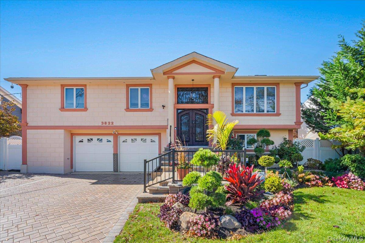 This 5 bedroom, 3 bath Hi Ranch blends comfort and style across two levels.