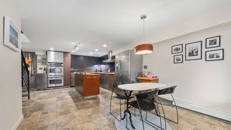 Enter on the first floor of a privately owned, four unit building, and you'll find this duplex Brooklyn home.