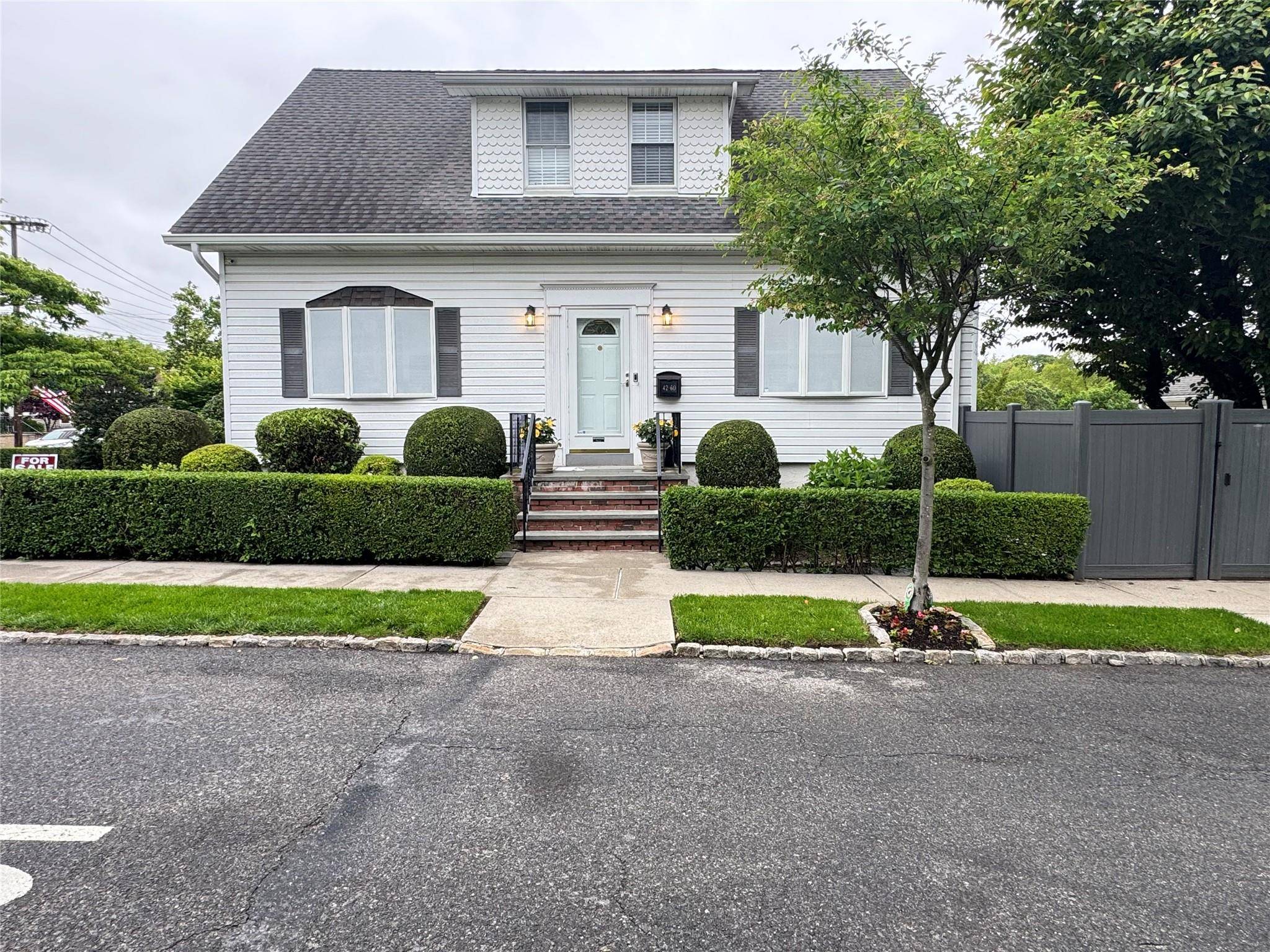 Beautifully maintained and spacious, this stunning one family Cape sits on a high, oversized corner lot in prime Little Neck, within top rated School District 26 and R3 zoning.