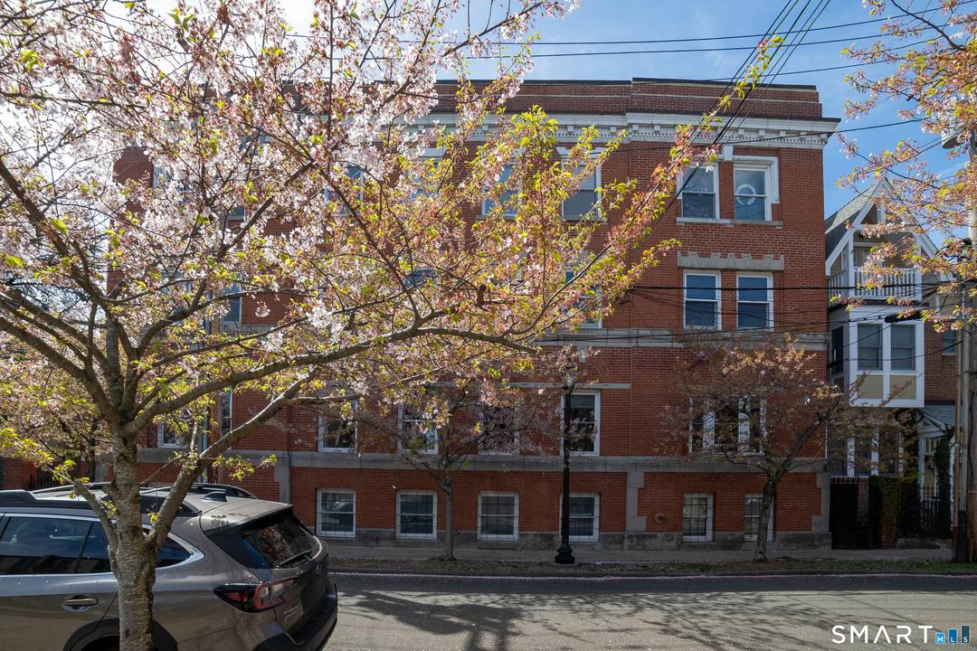 This luxury one level loft condo in Wooster Square in a converted 1890's brick building is truly exciting.