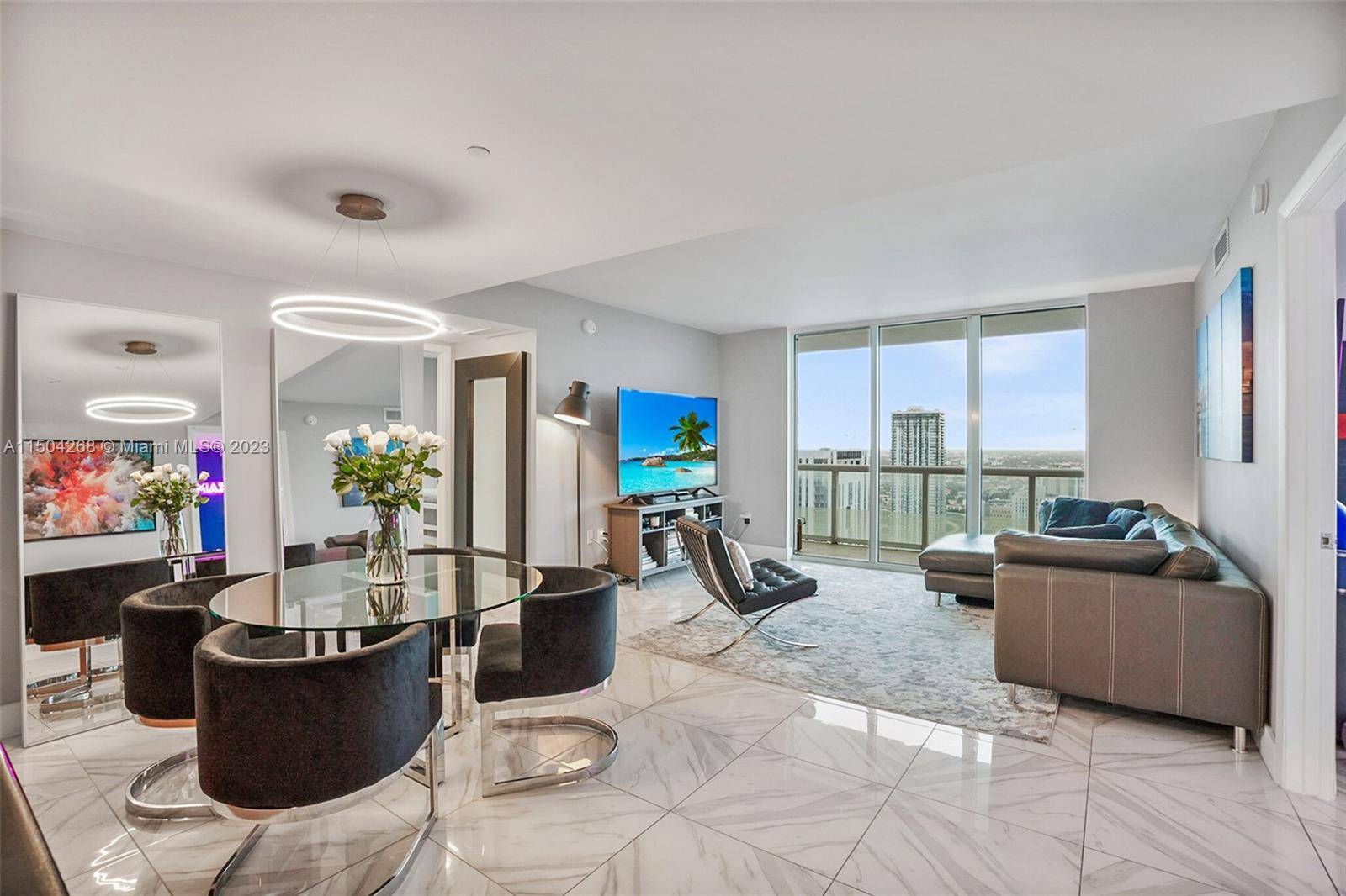 This 46th FL corner unit at 50 Biscayne features 2 Beds, 2 Baths w a large wraparound balcony facing South West.