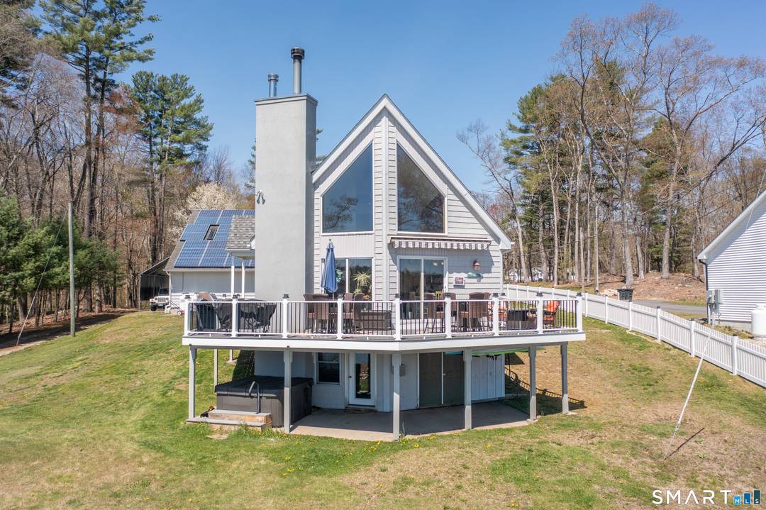 Rare opportunity to own 100 feet of beautiful pond frontage in Thompson, CT !