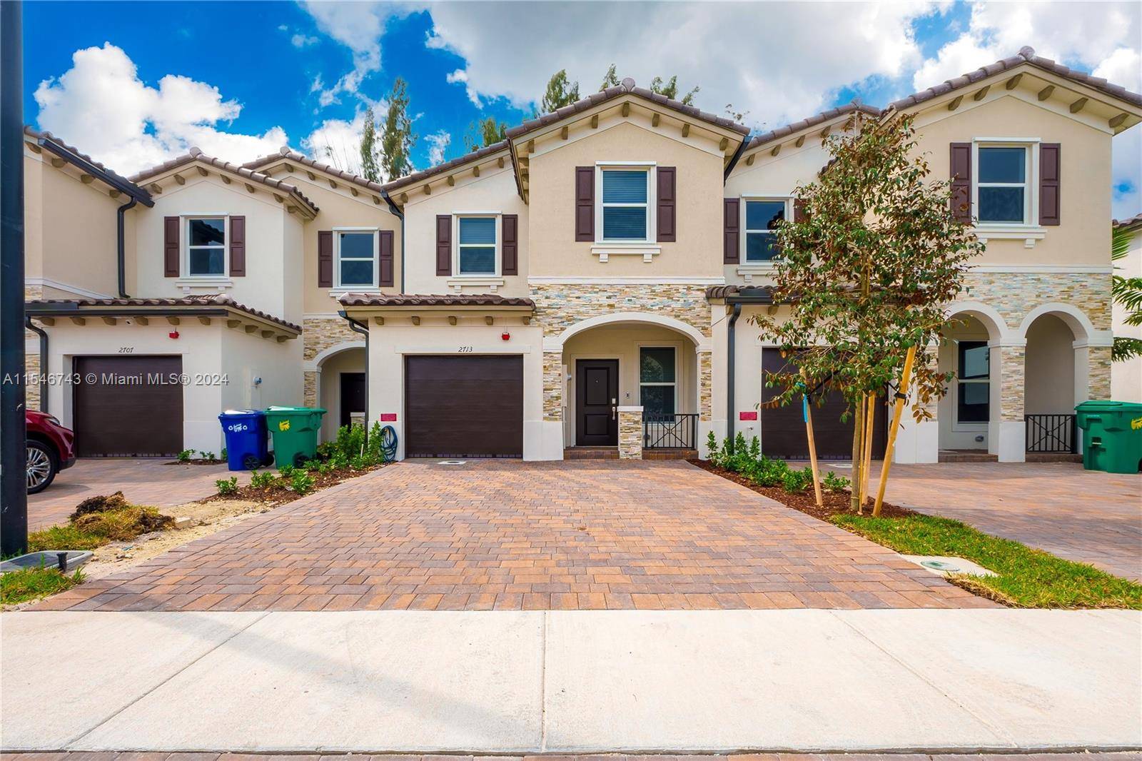 Brand new construction townhouse nestled within gated community offers an unparalleled residential experience.