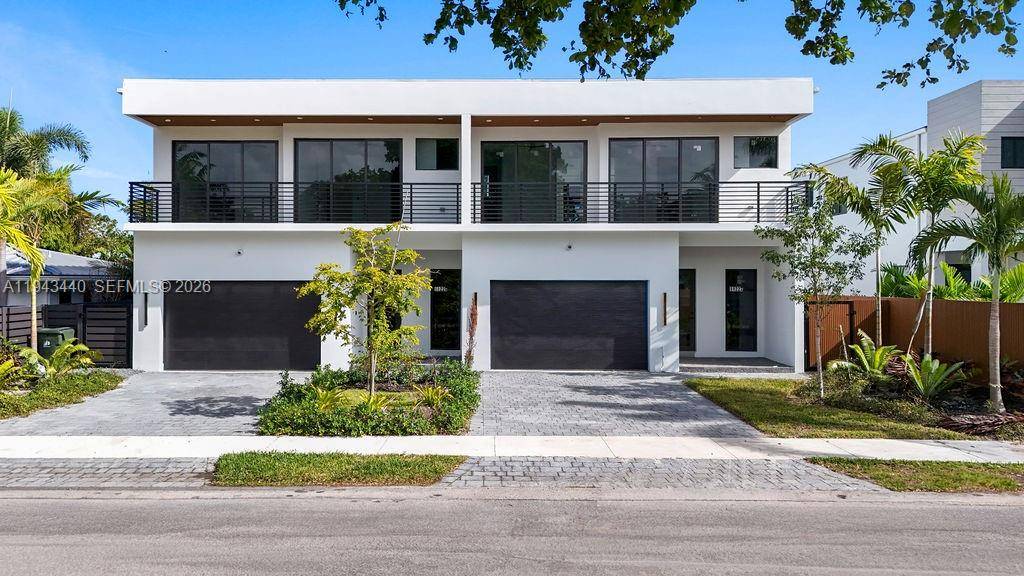 Exceptional new construction luxury townhome in the heart of Lake Ridge East Fort Lauderdale.