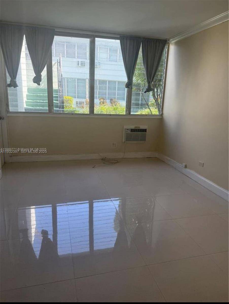 A place to call home. This is a great property, porcelain floors, new baseboards, freshly painted, new A C in the living room, new faucets, mirror and lamps.