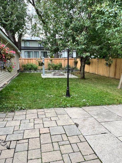 Enjoy the Nicely fenced Oasis Backyard Rare find with basement apartment.