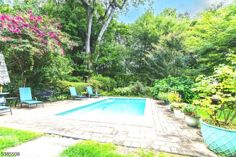 Charming cottage and separate two room office or artist studio situated on.