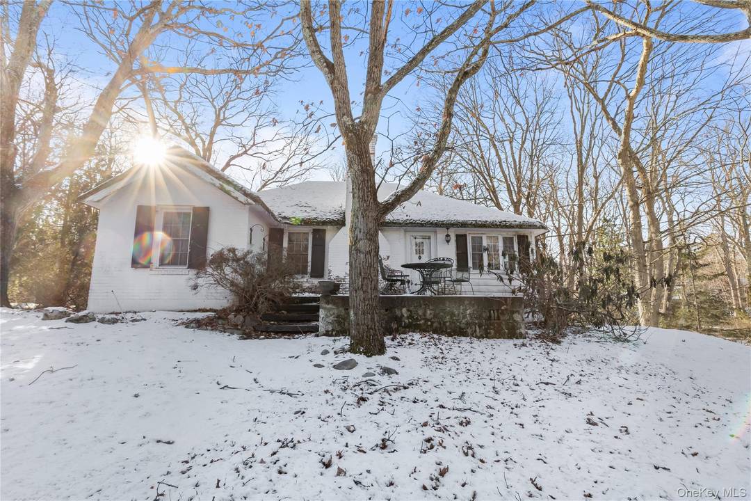 Tucked away on a Tranquil Road in Stony Brook, this home feels like something out of a fairy tale story.