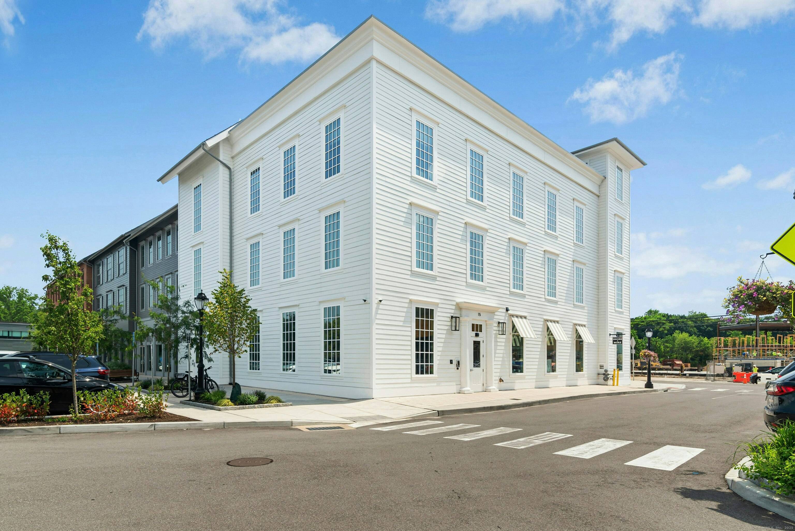 Step into this luxury unit that offers refined elegance, modern design, and privacy all in the heart of downtown Darien's premier neighborhood, The Corbin District.