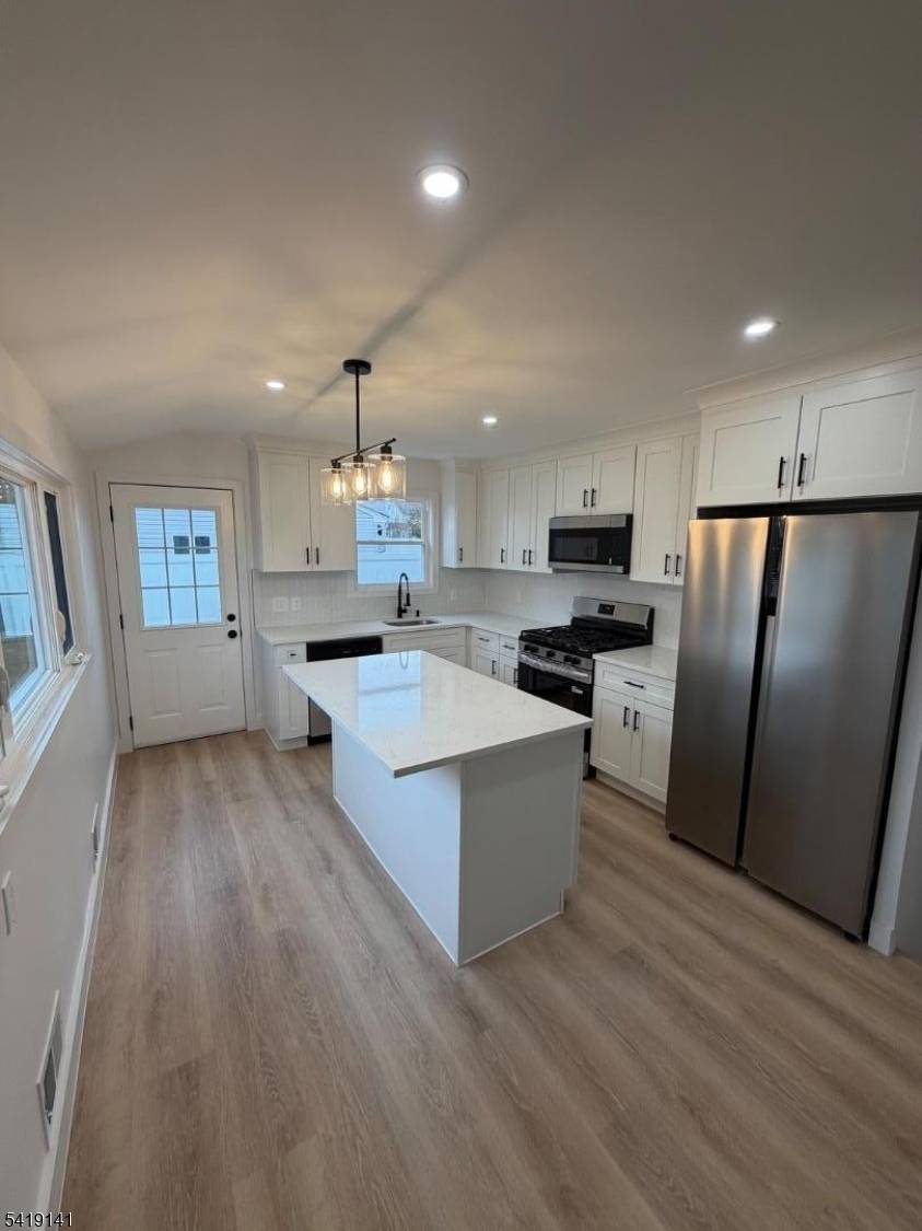 Fully Renovated Ready ! This 4 bed 2 bath split level has been completely transformed new 200 amp electrical panel wiring, recessed lighting everywhere, garage to sunken living room conversion, ...