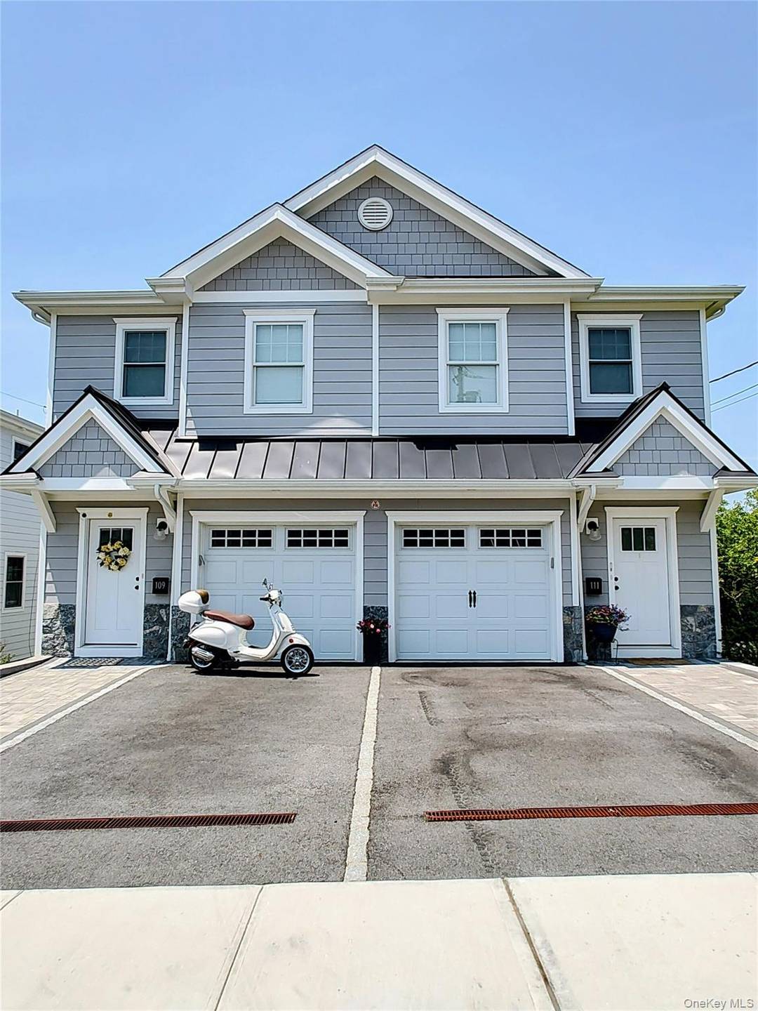 Sophisticated townhouse built in 2023, offering an easy lifestyle with an open floor plan on the first level and a powder room.