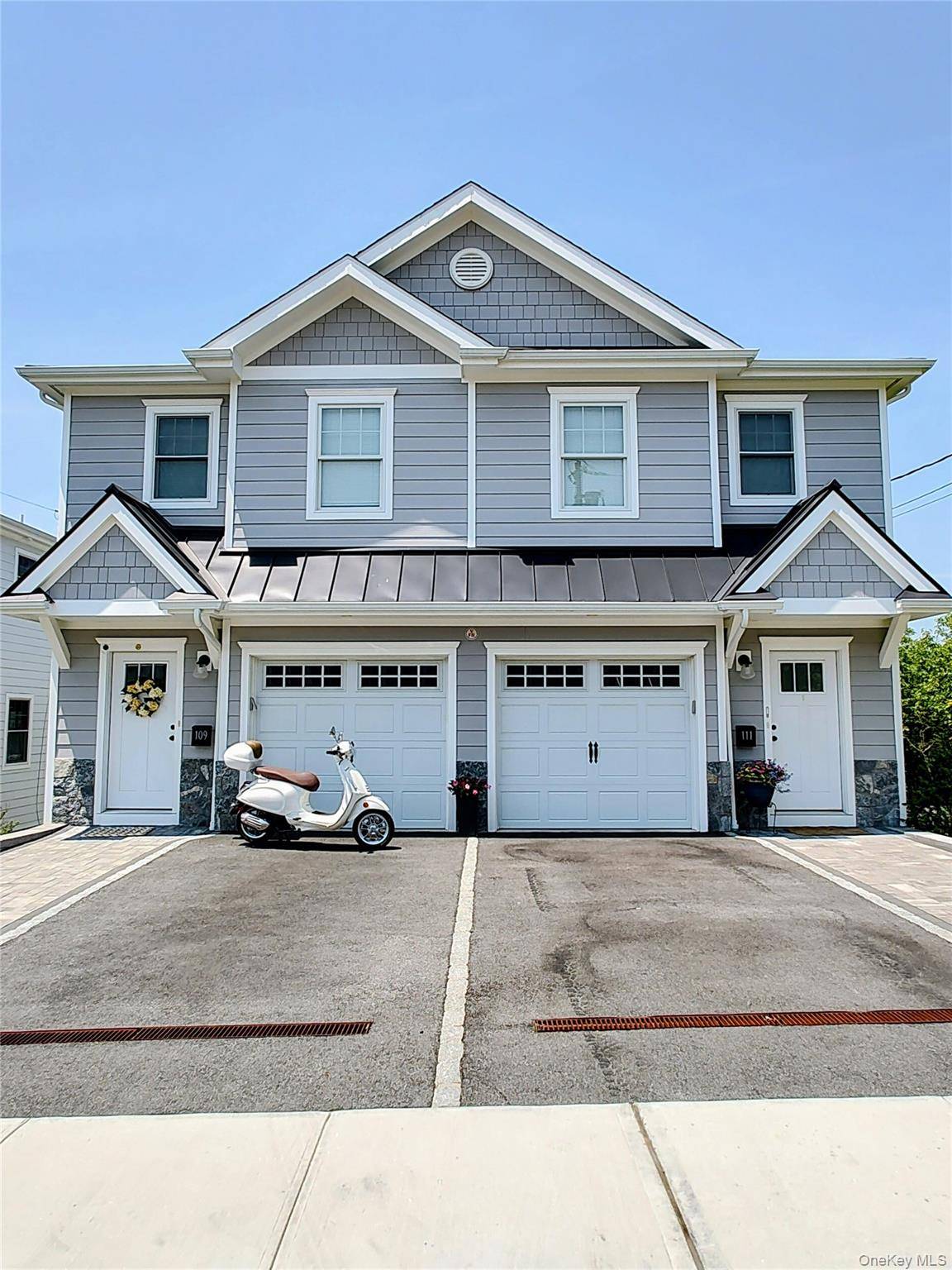 Sophisticated townhouse built in 2023, offering an easy lifestyle with an open floor plan on the first level and a powder room.