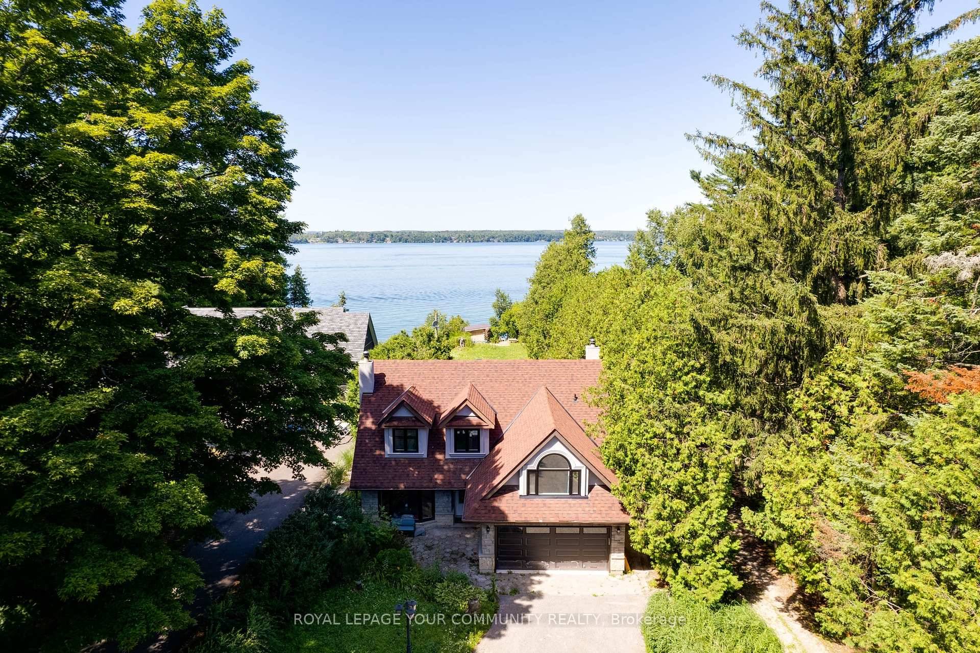 Experience luxury waterfront living in this fully renovated 4 season home with a detached 2 storey garage, ideally located in the prestigious Big Bay Point community on the western shores ...