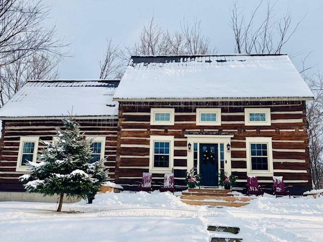 Step into a gorgeous one of a kind log home, expertly crafted in 2006 by re imagining and joining two original log houses from the 1800s.