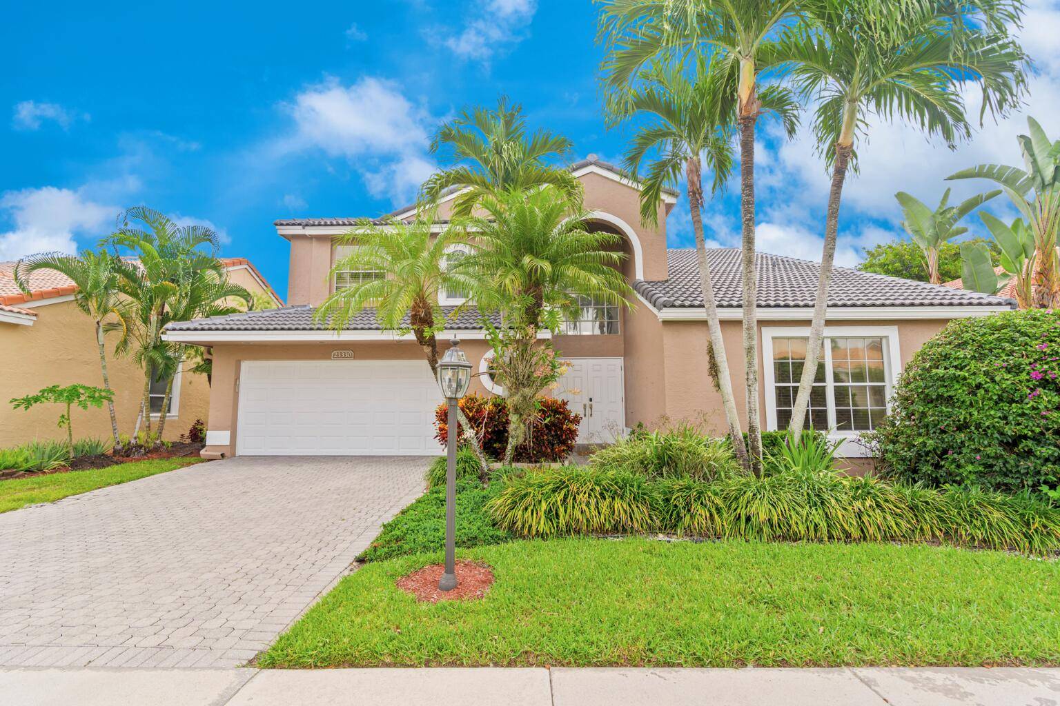 Boca Raton's best kept secret, an upgraded two story home with a pool at an unbeatable price !
