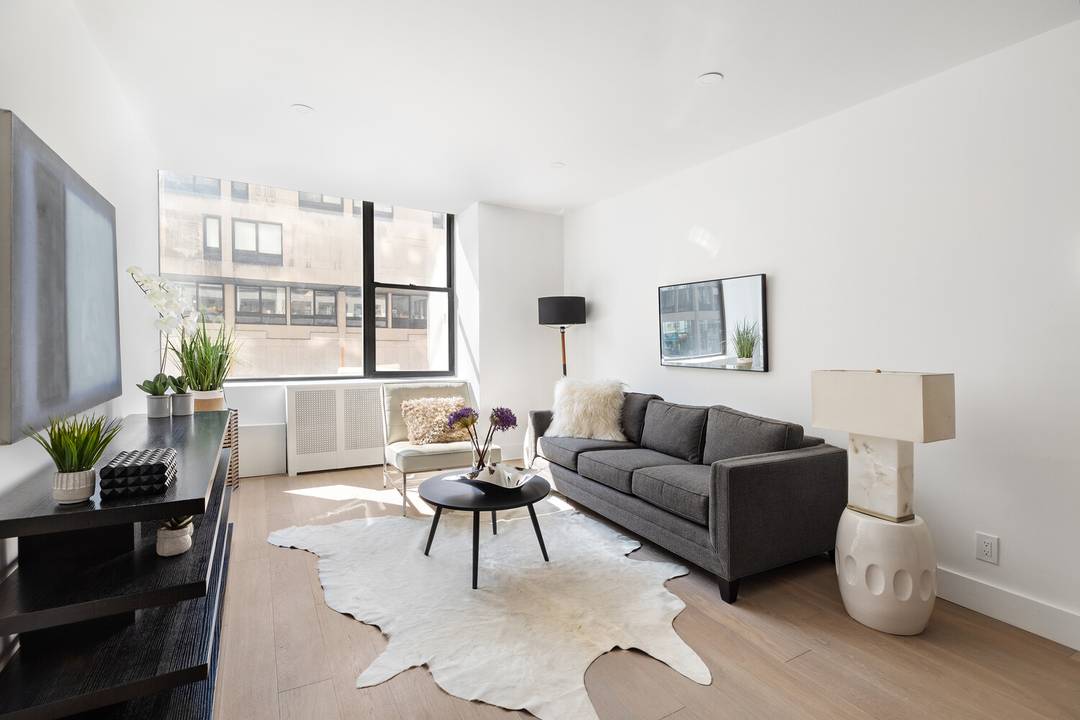 Sponsor Unit Introducing Apartment 3C in the historic Kheel Tower, a beautifully renovated, one bedroom, one bathroom home with wonderful natural light and oversized windows showcasing sunny, western exposures.