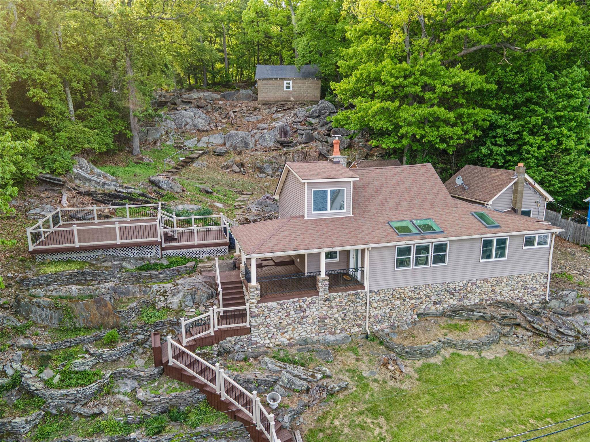 Welcome to this updated 3 bedroom, 1 bath home where modern convenience meets a peaceful lake setting.
