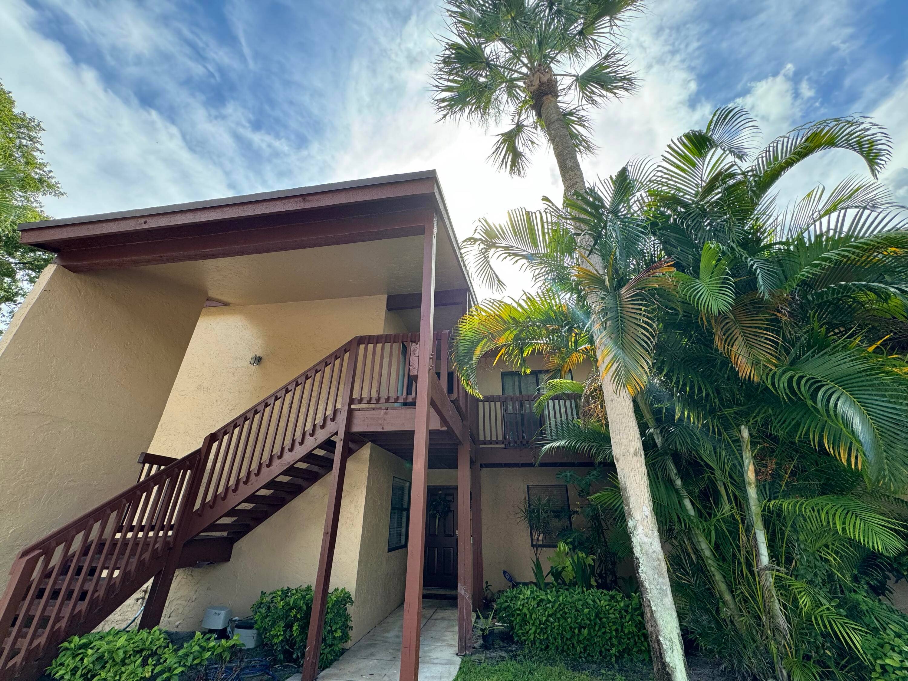 WELCOME HOME to this 2 bedroom 2 bathroom 2 story condo in the highly sought after family oriented community Trails at Royal Palm Beach !