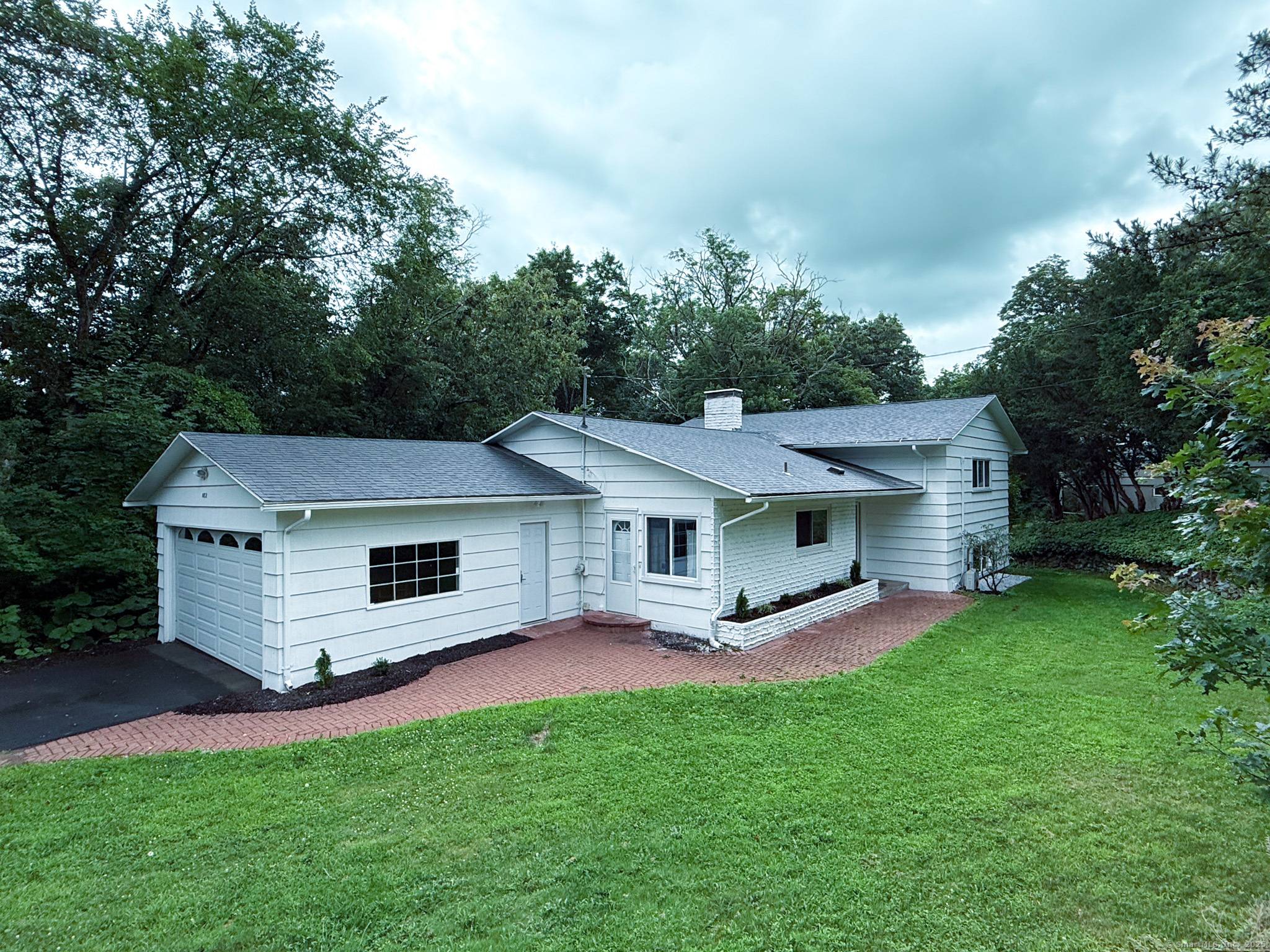 Welcome to 182 Knoll Drive, a beautifully maintained 3 bed, 2 bath home tucked away on a tree lined street in Hamden, CT.