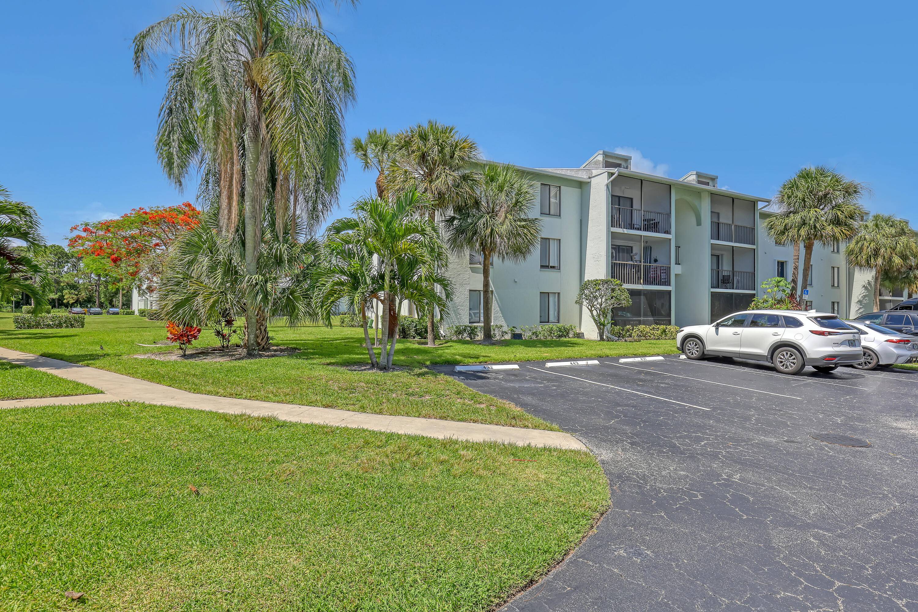 This spacious third floor unit is located in a gated community in West Palm Beach.