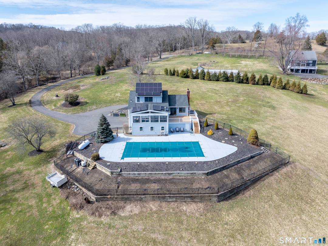 Beautifully sited, this striking Contemporary Cape commands sweeping panoramic views of the surrounding landscape.