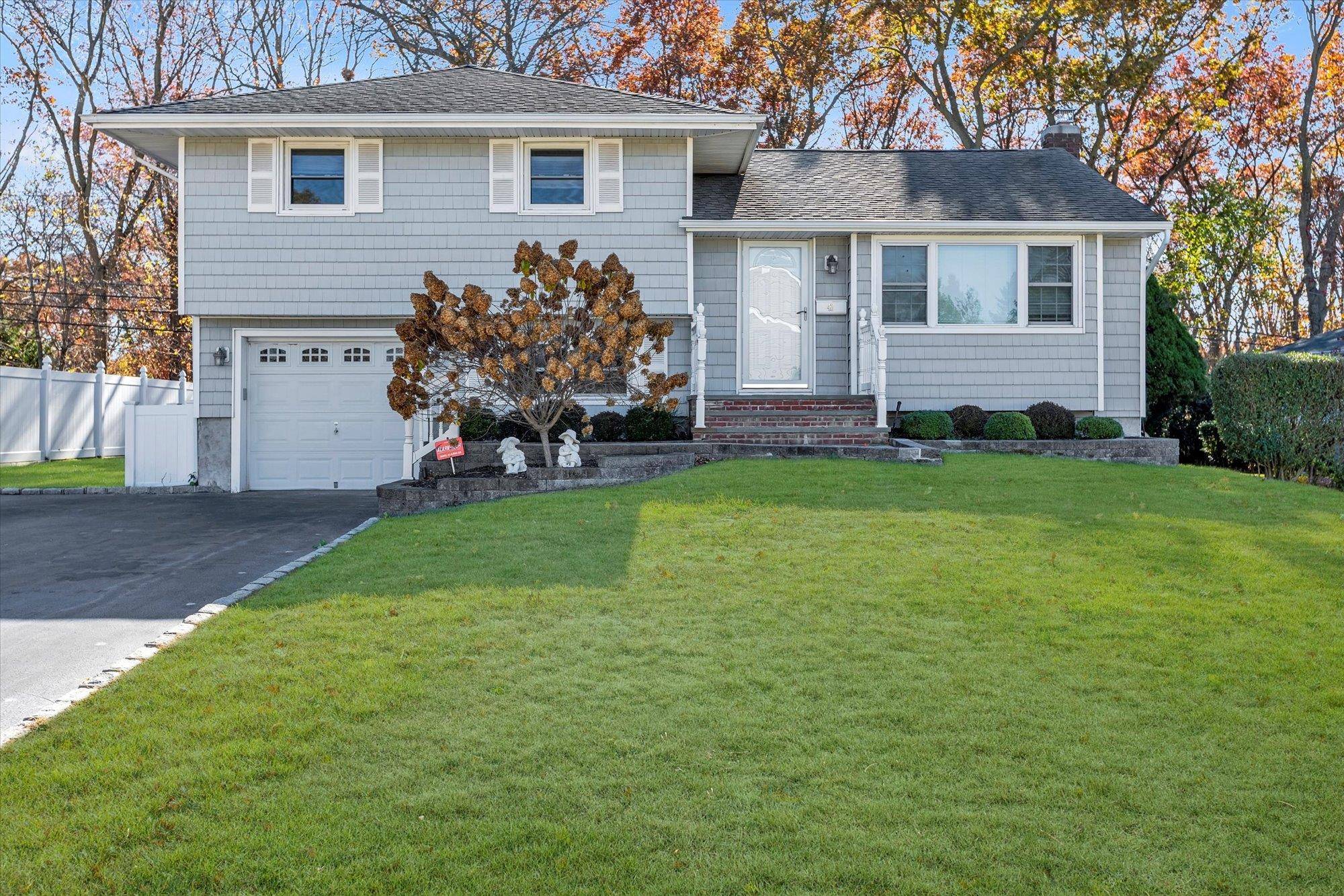 Recent Update Split level located at Commack school district.