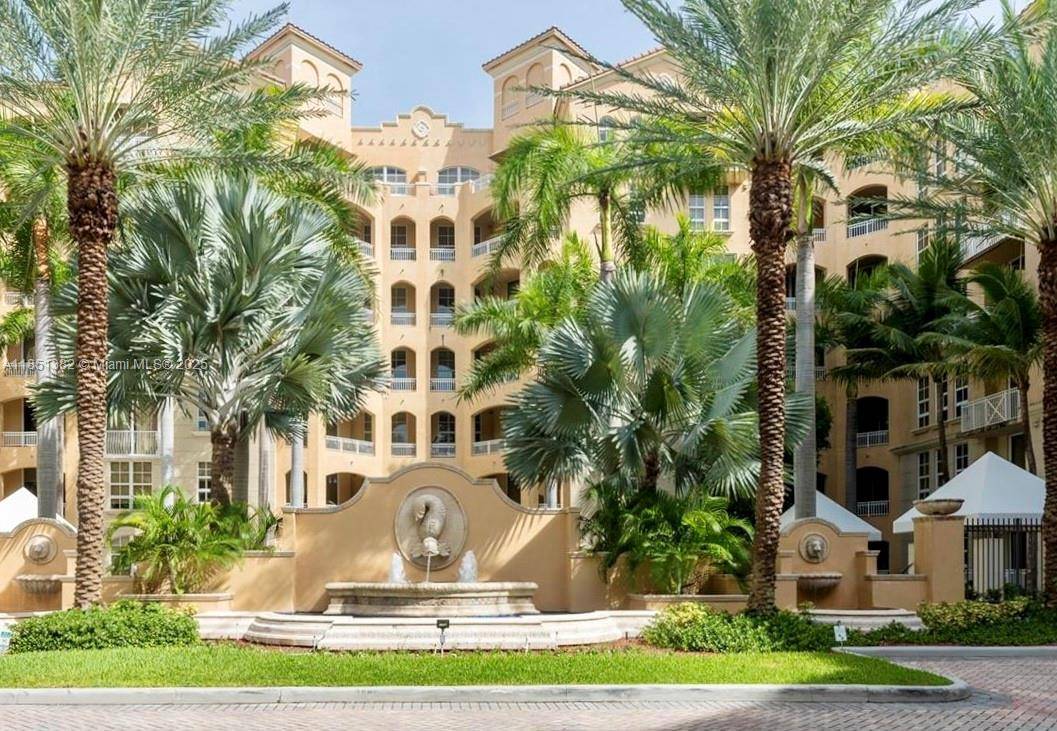 Introducing a rare gem nestled in the heart of Aventura a magnificent Penthouse 2 2 den boasting soaring 14' ceilings adorned with elegant crown molding.