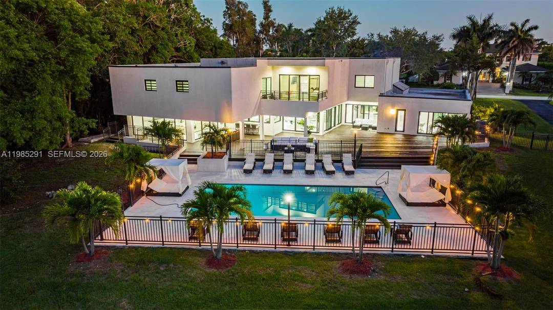 This fully renovated 9 bedroom estate with loft and 6 bathrooms offers 8, 582 square feet under air.