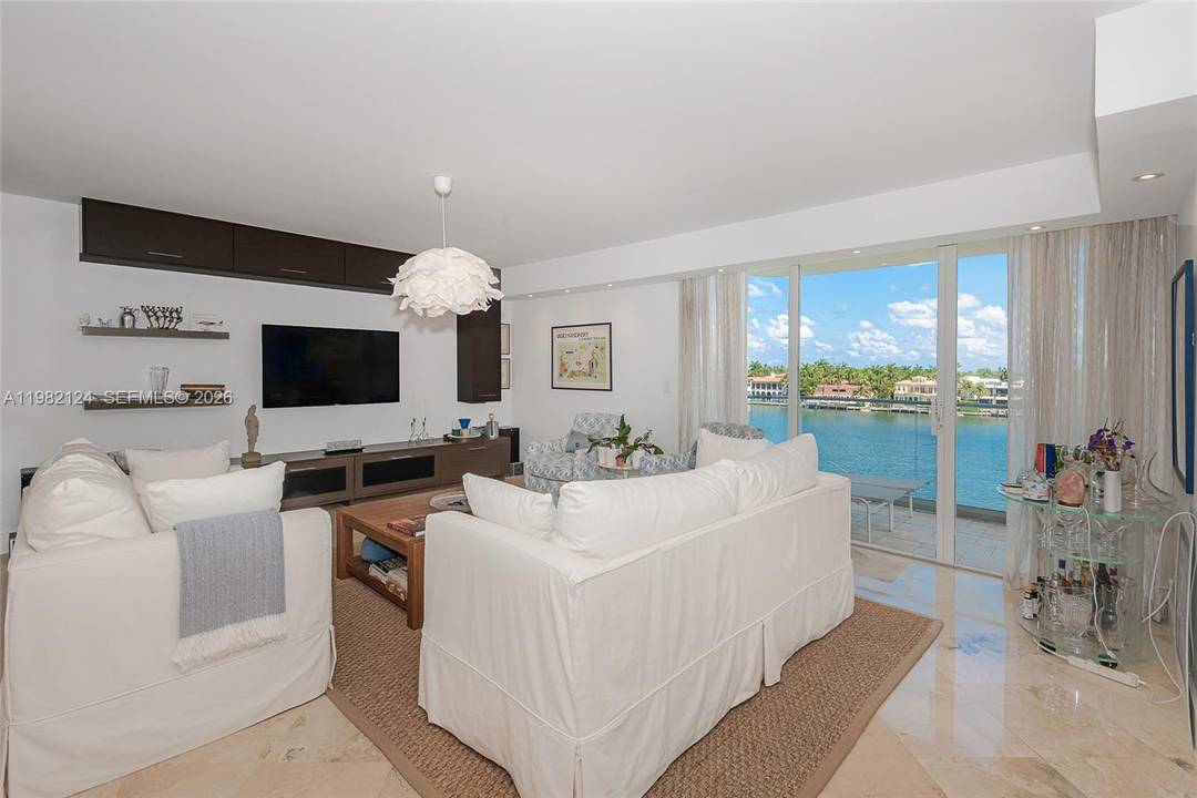 This masterfully curated 2BR 2BA residence spans 1900 SF of pure sophistication, featuring a professional Contemporary Transitional design that perfectly balances modern edge with timeless warmth.