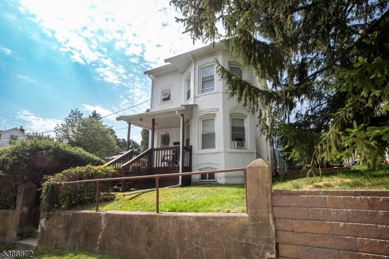 Welcome to this charming two family home !