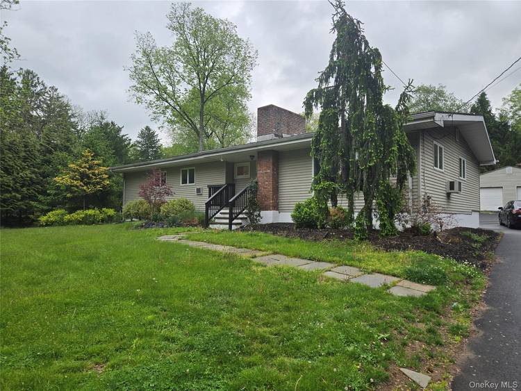 Spacious Extended Ranch Home Beautiful and spacious 5 bedroom, 3 bath extended ranch situated on a meticulously maintained property with gorgeous landscaping and exceptional curb appeal.