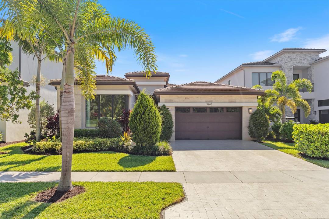 Welcome to effortless luxury living in Boca Bridges.