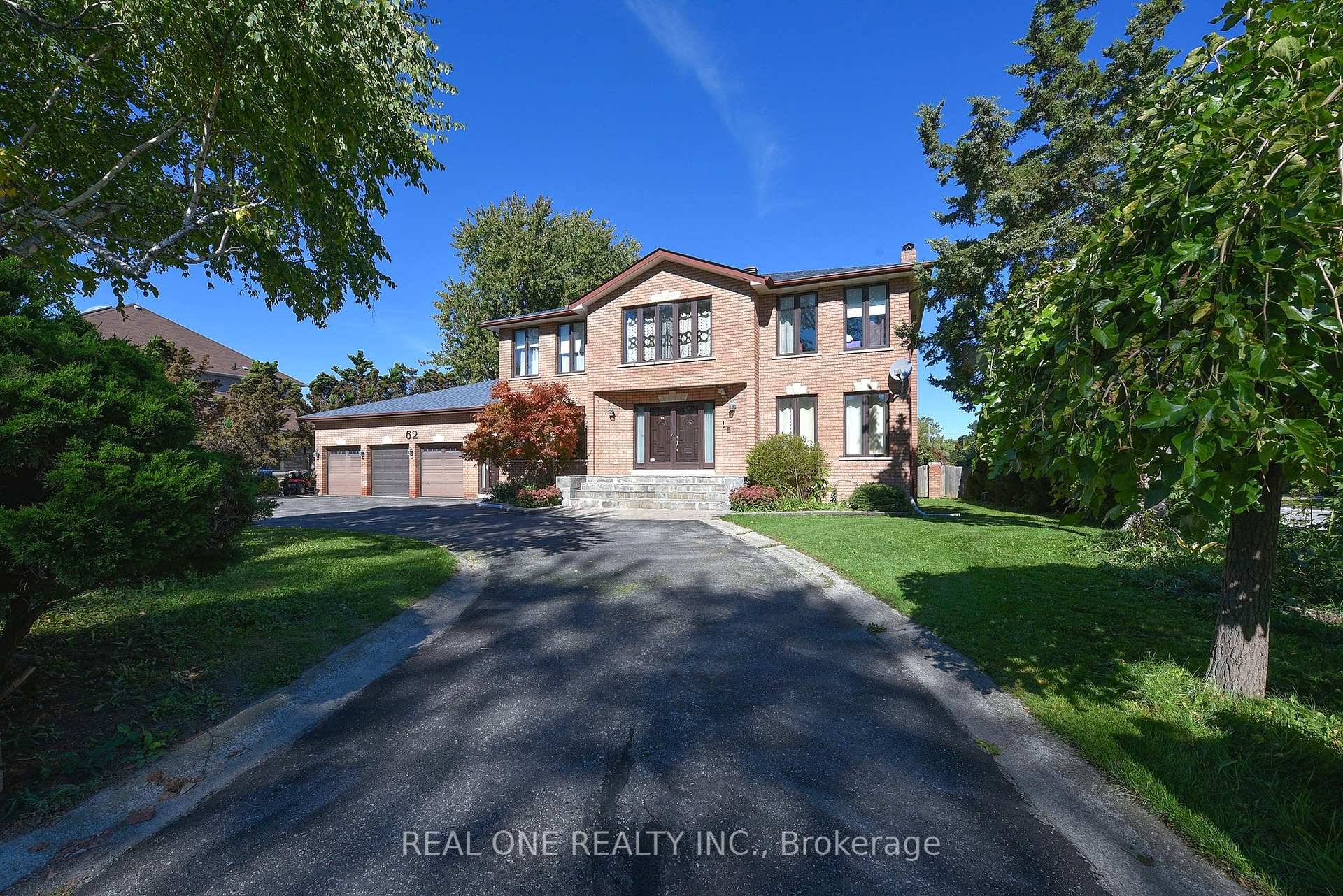 Rare find ! Executive 3 Car Garage home situated on a premium half acre corner lot w a circular driveway amp ; ample parking.