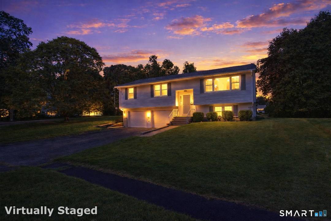 HILLTOP 3BR Raised Ranch with a bright, open floor plan and exceptional indoor outdoor living !