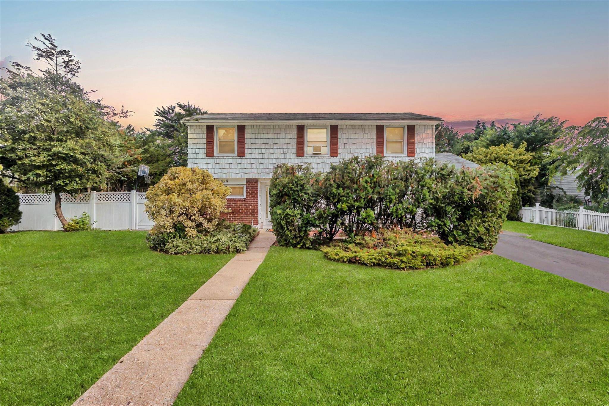Welcome to this charming and spacious Split Level home featuring 4 bedrooms and 1.