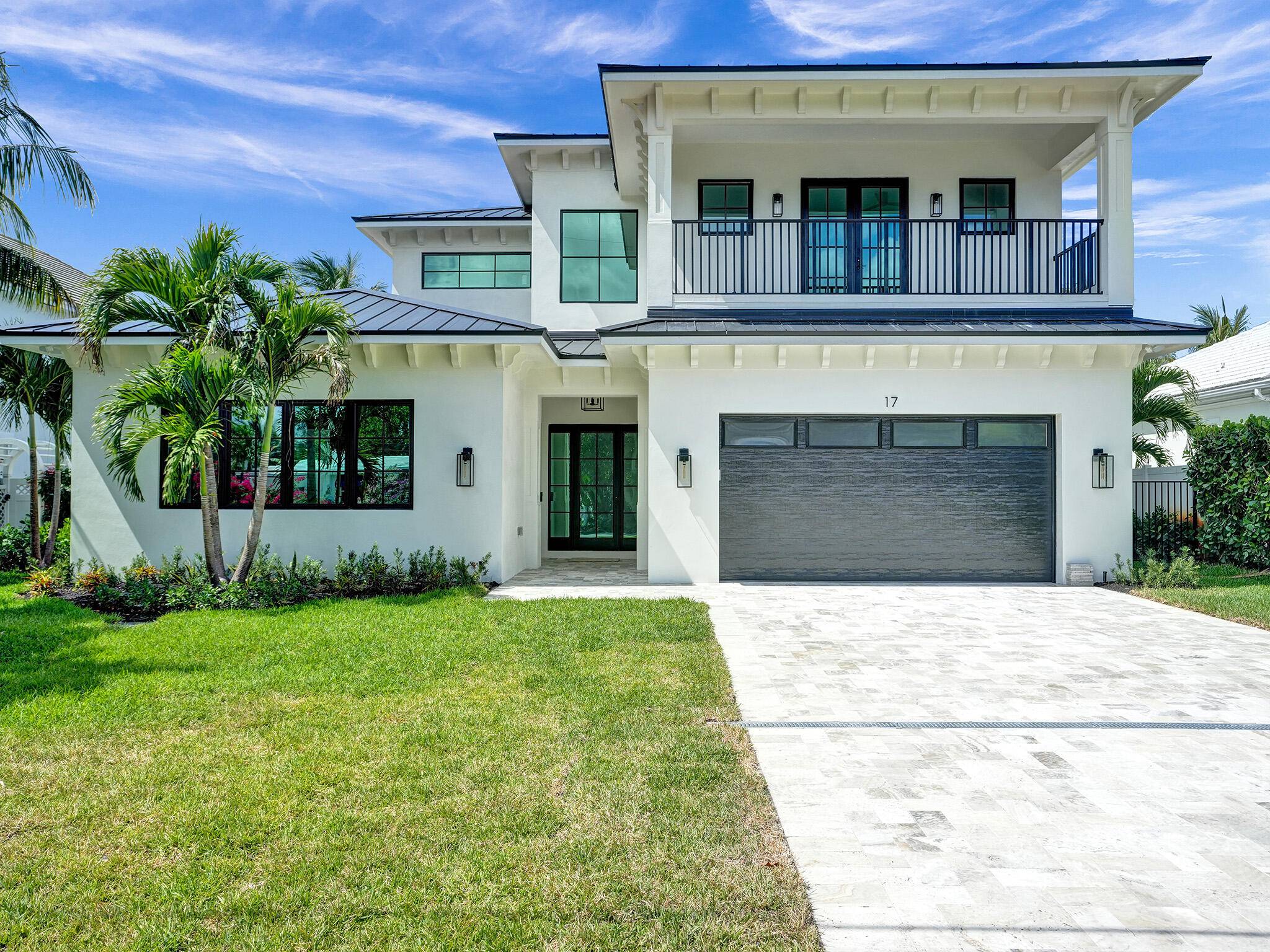 Newly built stunning Contemporary Key West custom home in the sought after Lake Ida neighbourhood of Delray Beach, steps away from Pineapple Grove a short drive to the beach.